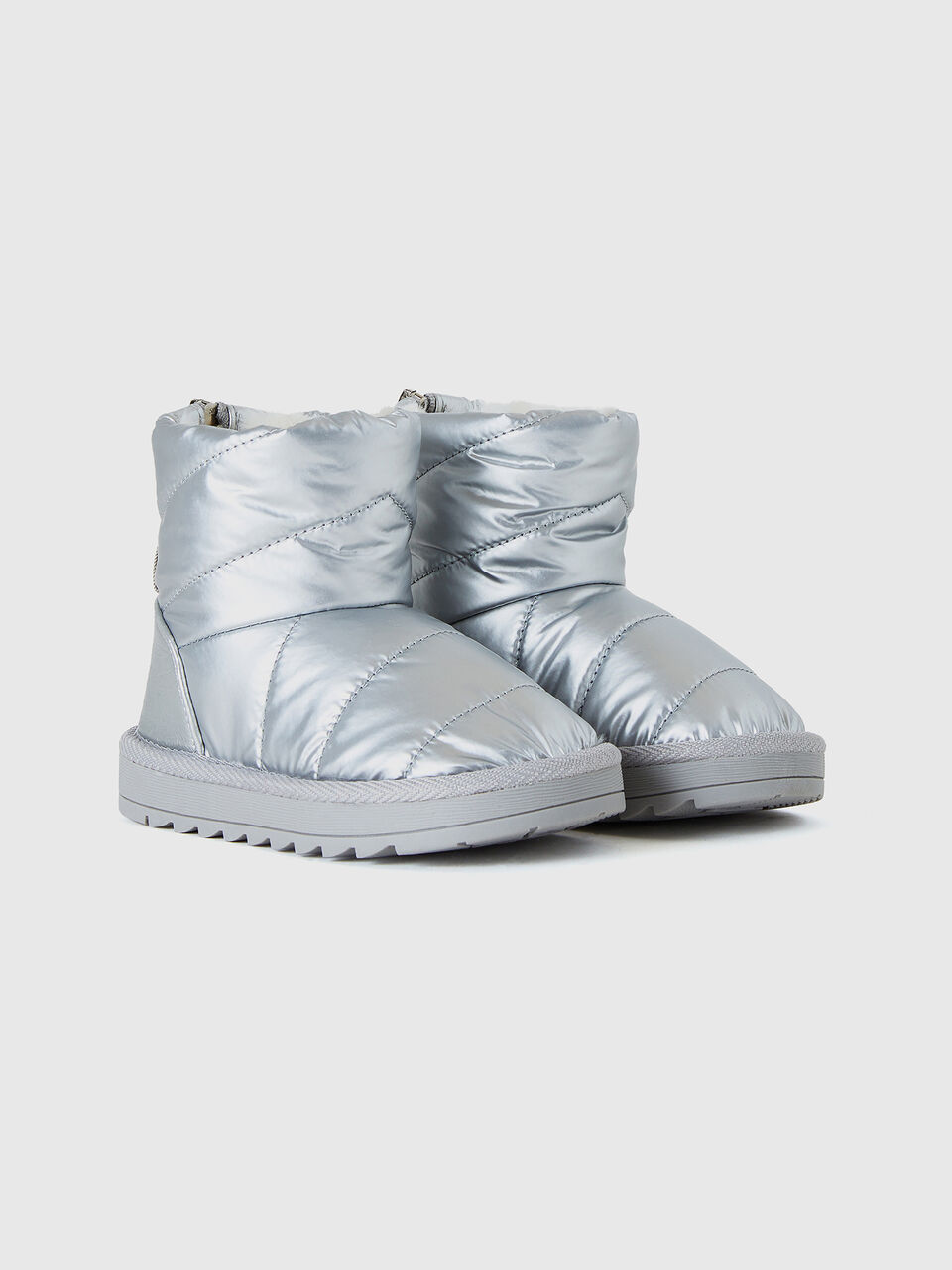BOOT Niña image number null