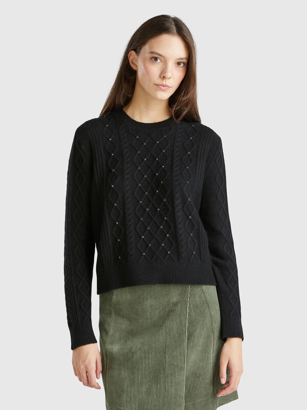 Jersey con ochos y strass Mujer