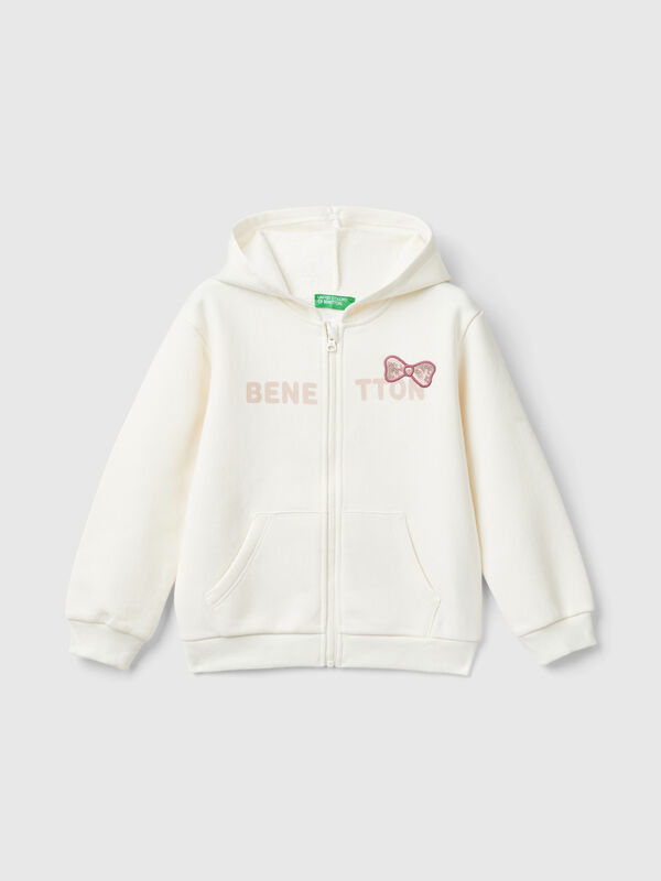Sudadera con cremallera y lentejuelas Niña