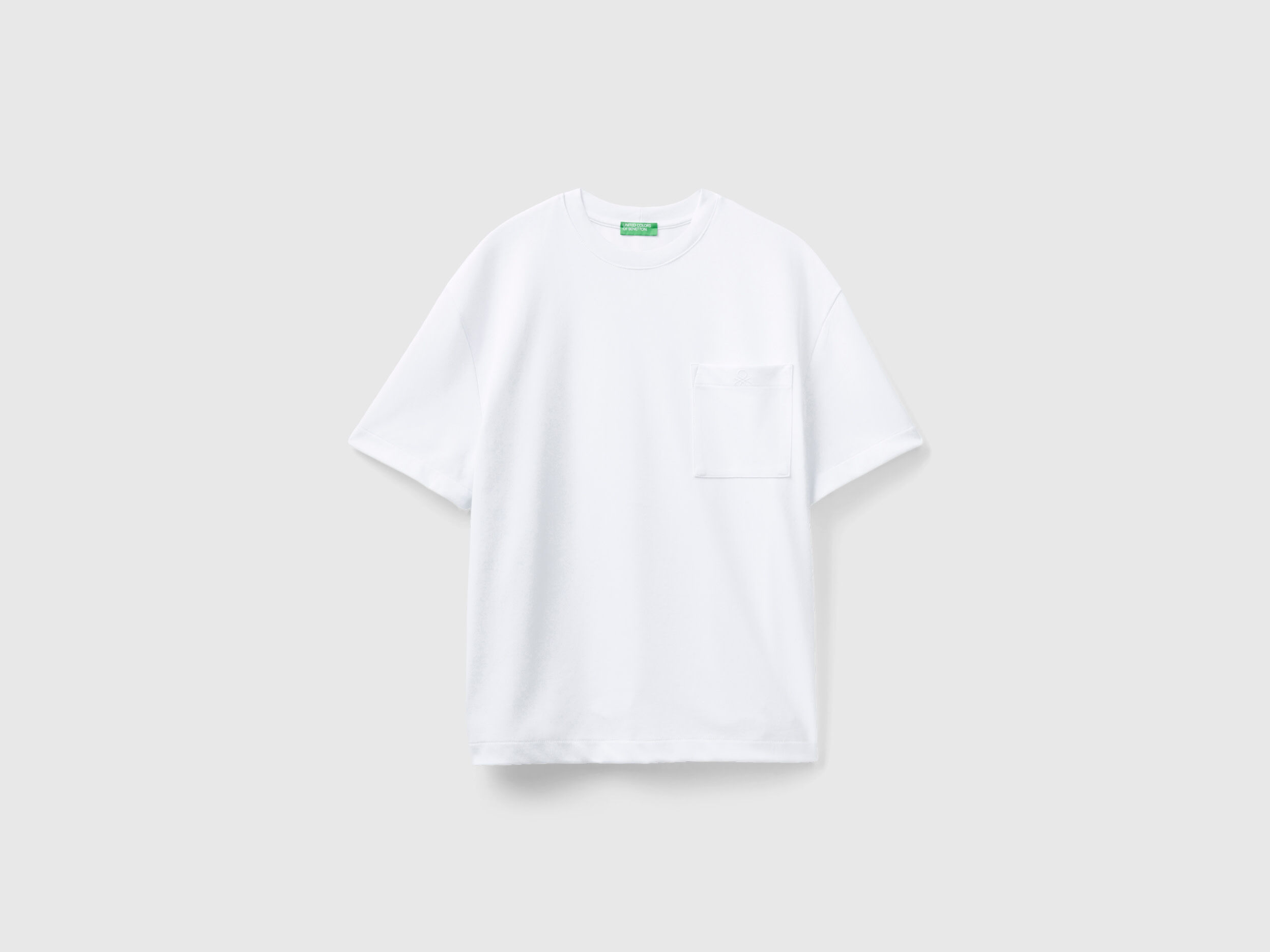 Camiseta blanca con bolsillo shop