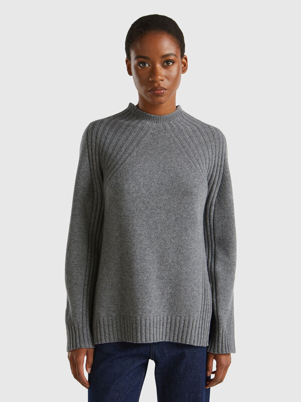 Jersey de cuello alto con aberturas Mujer